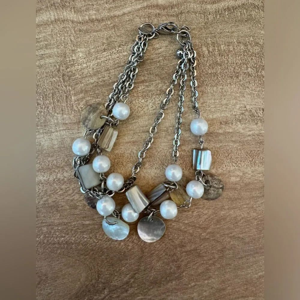 Multi-strand Mother of Pearl Bracelet Silver tone Signed (unsure of signature)